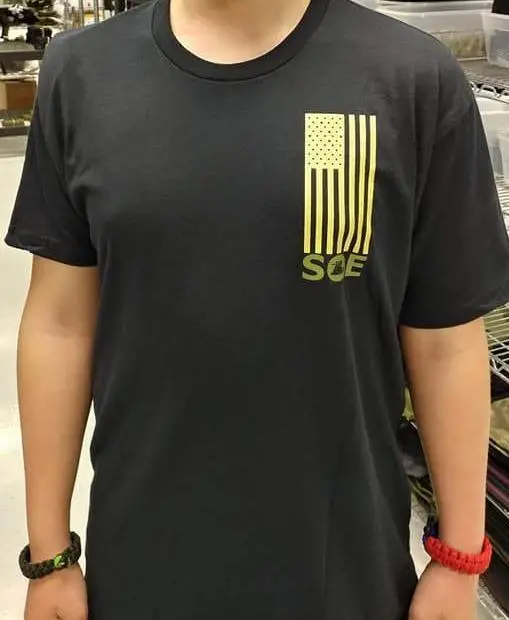 Tan Background Flag Pattern T-Shirt 1