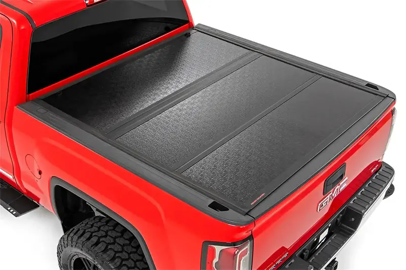 Rough Country Hard Tri-Fold Aluminum Tonneau Cover – Textured Black With Rail Caps 1